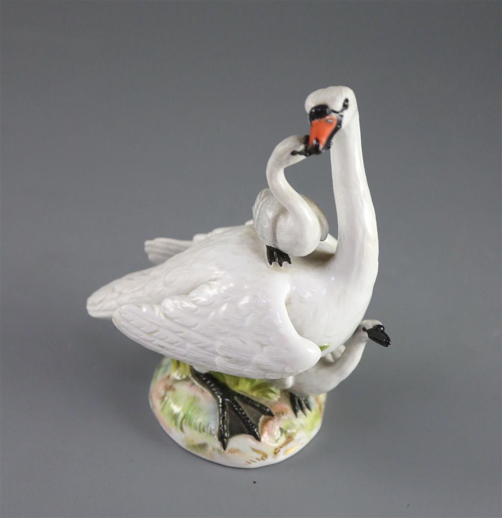 A Meissen group of a swan with cygnets, late 19th century, 13.5cm high